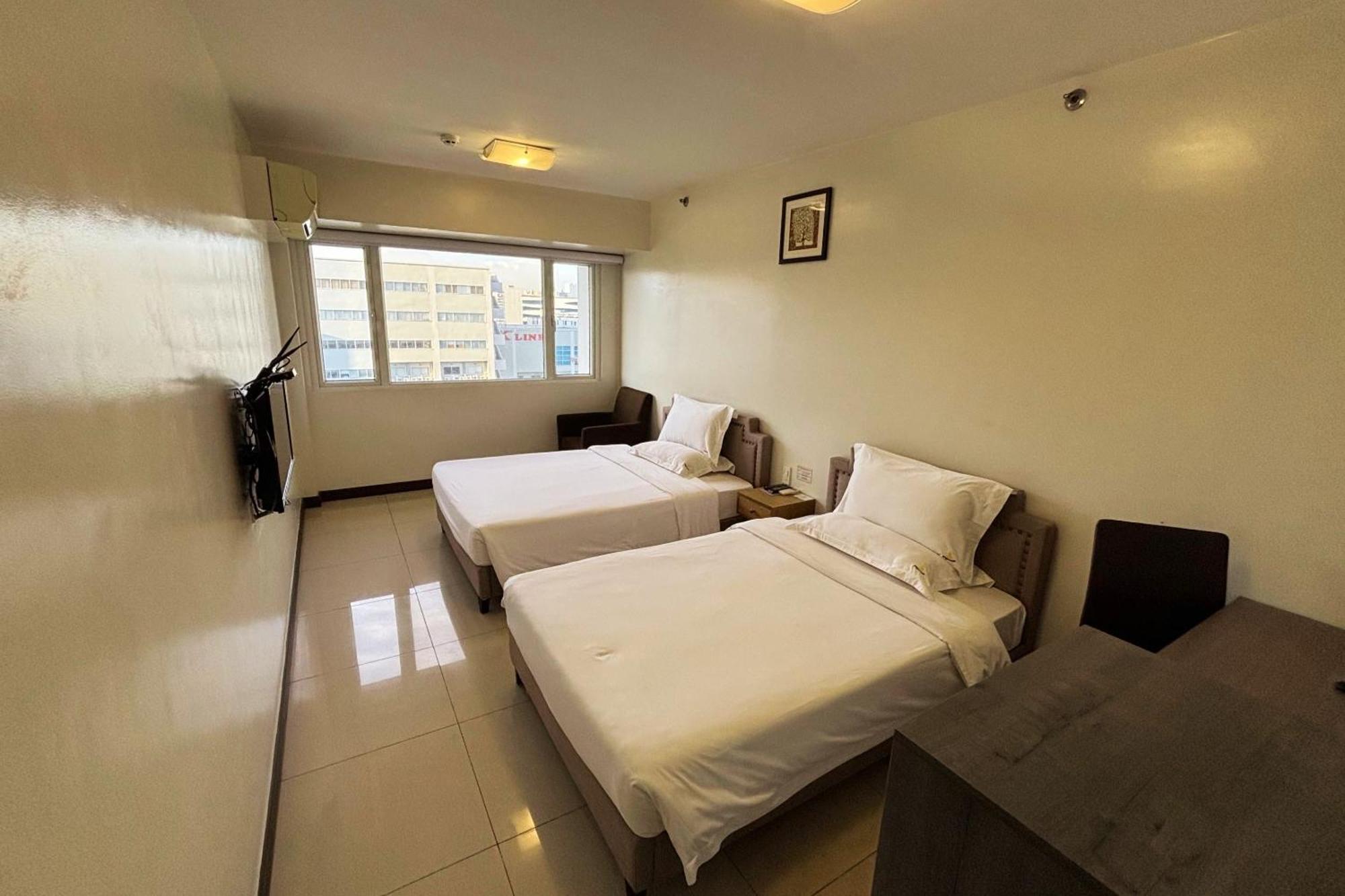 Extremeli Suites Manila Powered By Cocotel Exterior foto